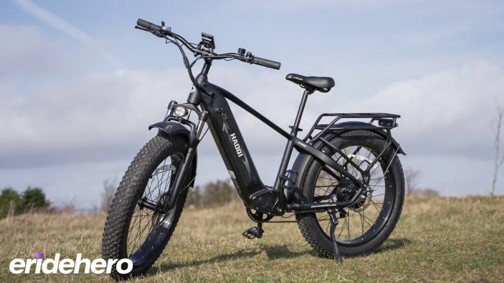 Haoqi Eagle electric bike on grass why a blue sky behind